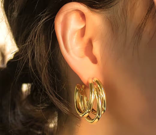 Set of 2 pairs silver and gold triple layered hoop earrings