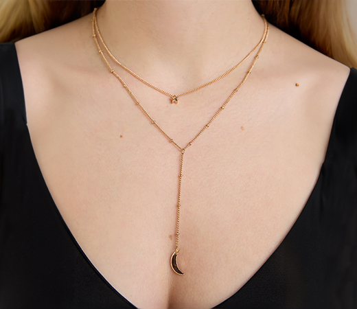 Gold Layered Star And Moon Necklace
