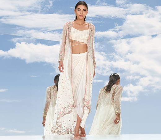Mandira Wirk ivory embroidered jacket with bustier and skirt