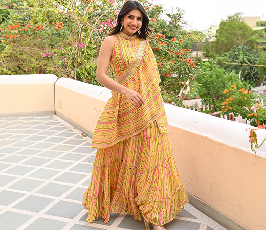 Bunaai floral pre-draped saree with stitched blouse.