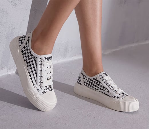 White and black sneakers with chequered pattern