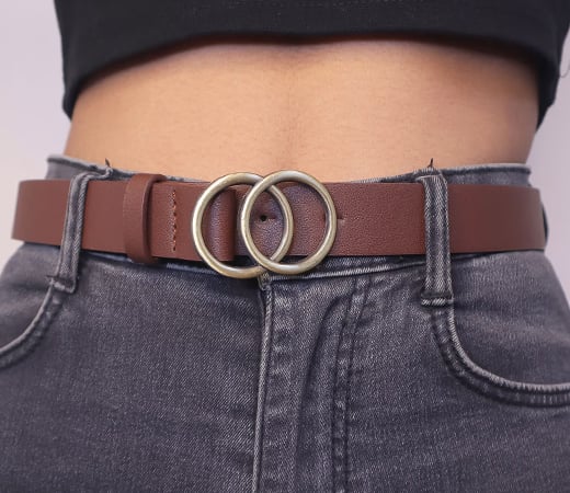 Woman modelling faux leather belt