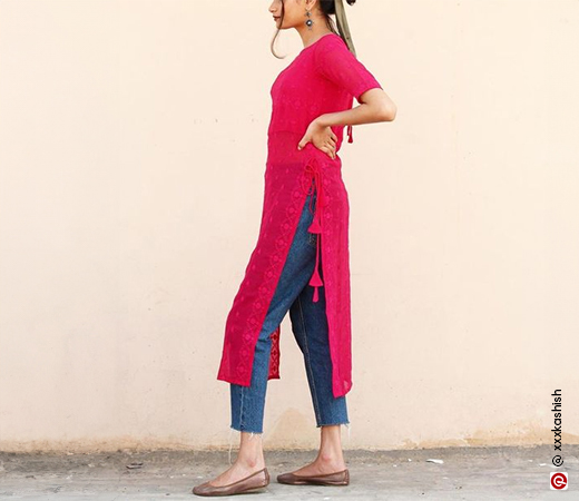 Woman wearing jeans with pink kurta