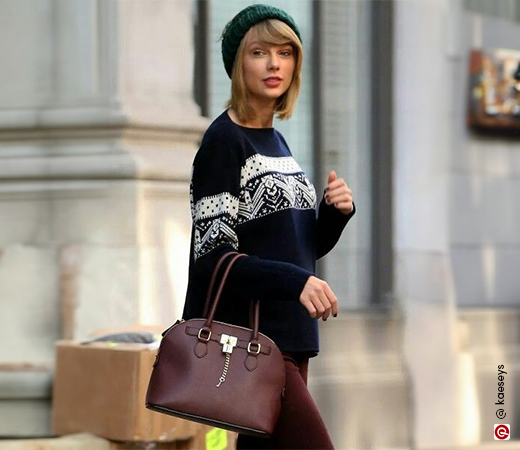 Taylor Swift wearing a printed sweater