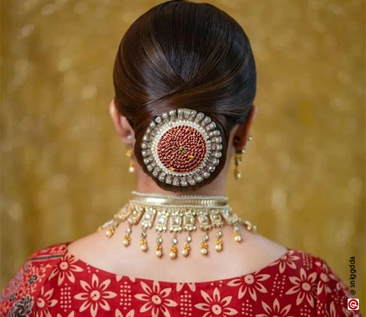 Woman wearing bun pin