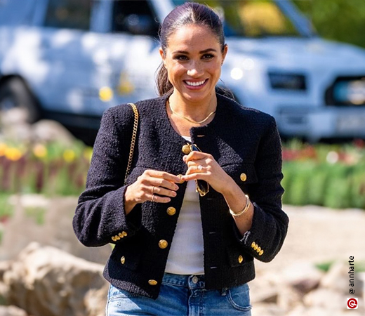Meghan Markle wearing a tweed jacket with denim 