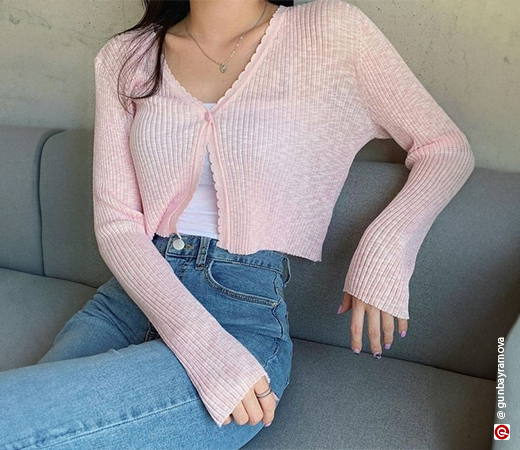 Woman wearing a pink cardigan