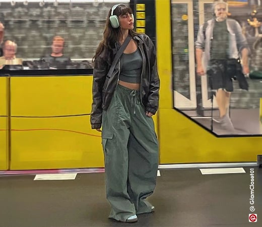 Woman wearing baggy cargo pants with crop top and jacket