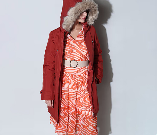 Women wearing red fur hooded parka
