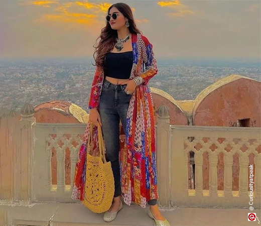 Woman wearing an ethnic print shrug