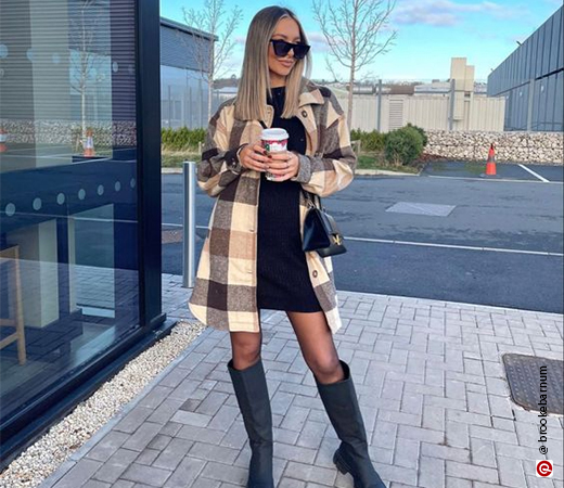 Women wearing a shacket with a dress