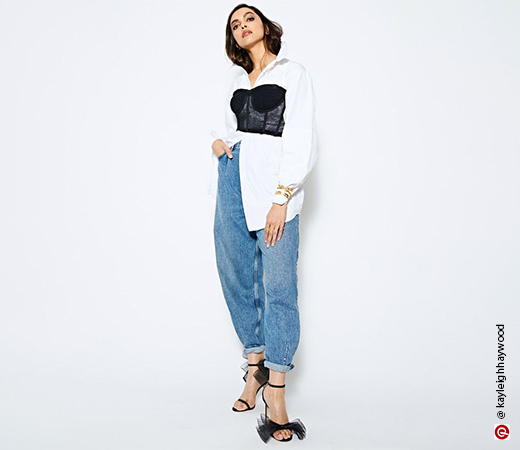 Deepika Padukone in an oversized white shirt under a laced corset top