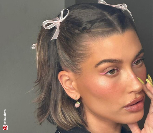 Hailey Bieber wearing bow hair clips