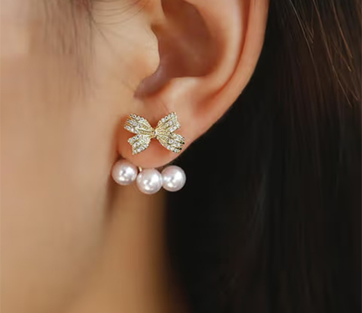 Bow Shaped Stud Earrings by Yellow Chimes