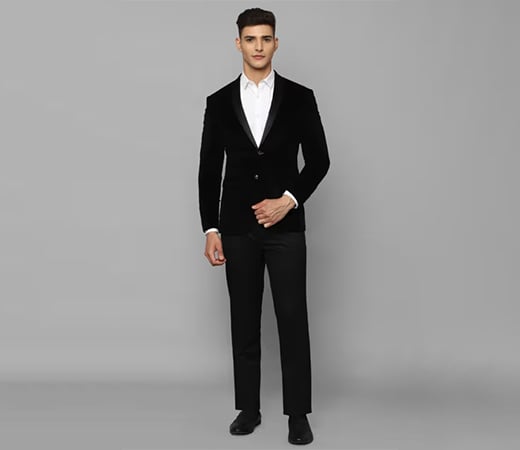 Man wearing Allen Solly Men Black Slim Fit Solid Party Suit