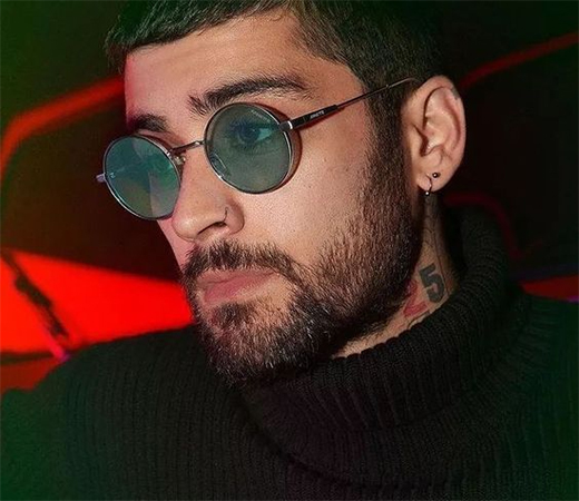 Zayn Malik wearing round sunglasses