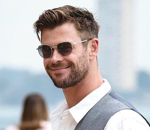 Chris Hemsworth wearing geometric sunglasses