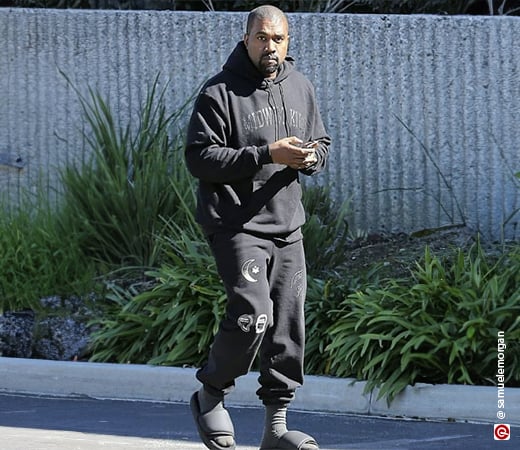 Kanye West wearing black joggers