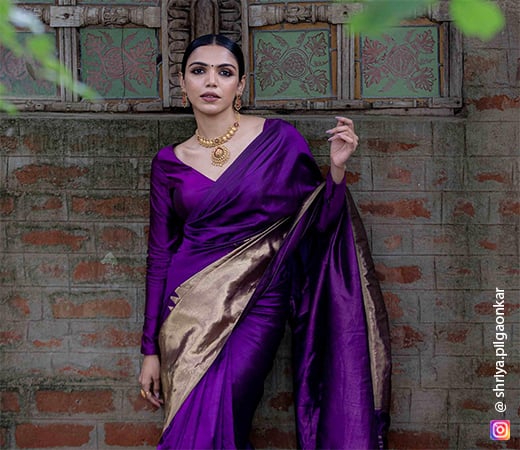 Sriya Pilgaonkar wearing a purple saree