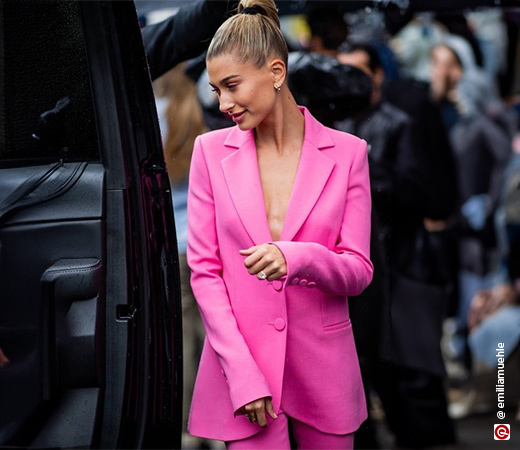 Haily Beiber wearing a hot pink blazer set