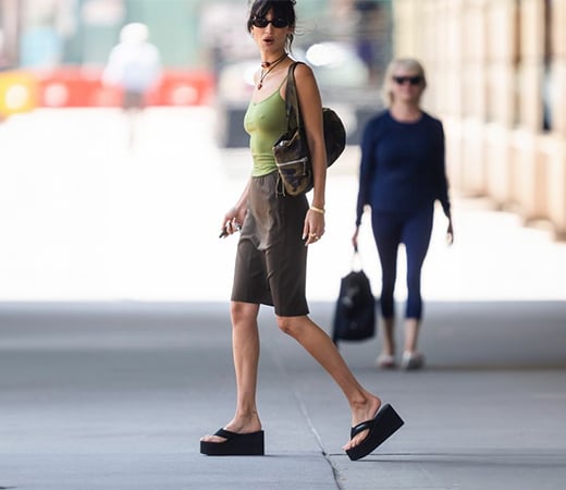 Bella Hadid wearing platform flip-flops