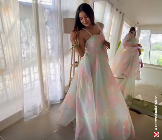 Woman wearing a pastel organza anarkali dress 