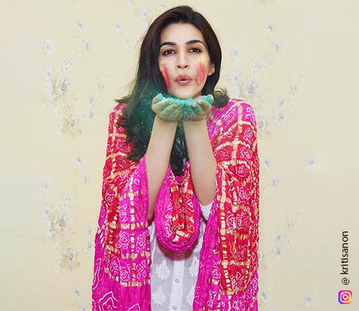 Kriti Sanon wearing a bold pink dupatta and chikankari kurta