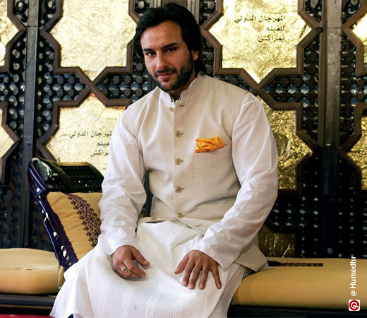 Saif Ali Khan wearing a white kurta with a beige Nehru jacket