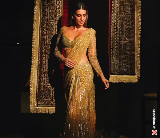 Kriti Sanon wearing a gold sequined saree