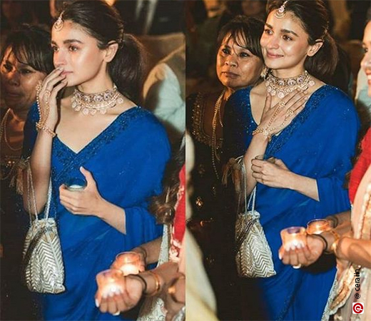 Alia Bhatt wearing a dark blue saree
