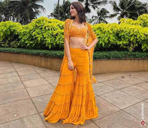 Ananya Pandey wearing a yellow sharara and crop top set