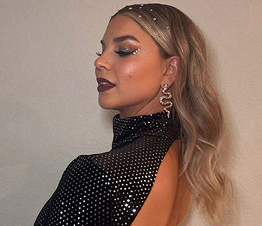 Woman wearing snake earrings