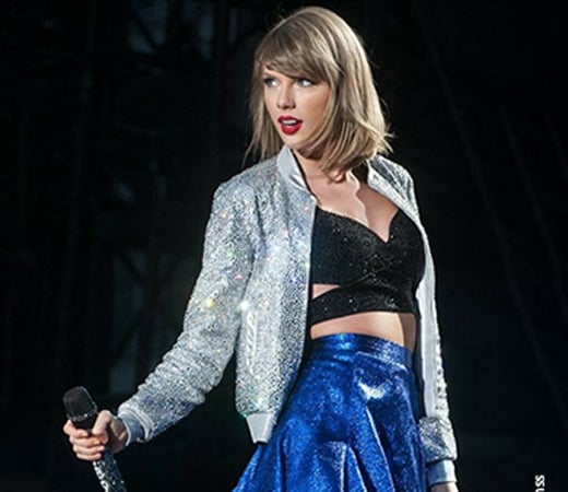 Taylor Swift wearing sequin jacket