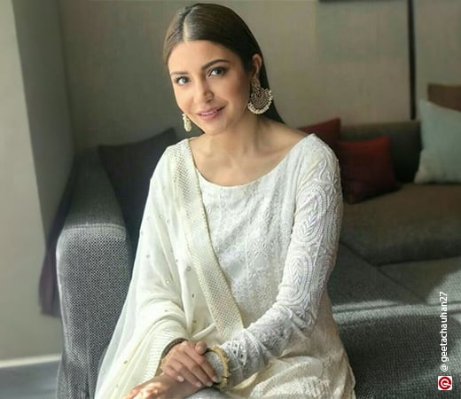 Anushka Sharma wearing a chikankari kurta with earrings