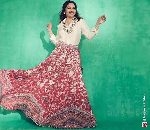 Madhuri Dixit wearing a red skirt with a shirt