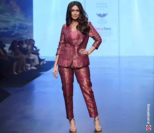 Mrunal Thakur wearing a brocade jacket and trousers