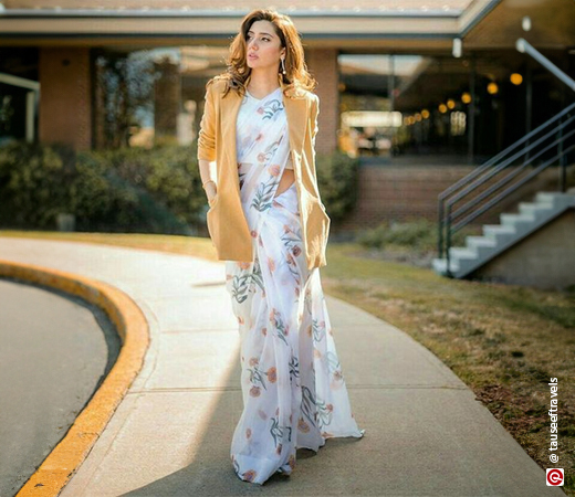 Mahira Khan wearing a floral saree with a matching blazer