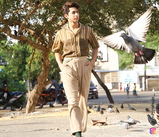 Mihir Ahuja in brown shirt and trousers