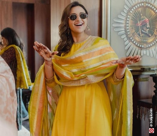 Parineeti Chopra wearing a yellow anarkali suit