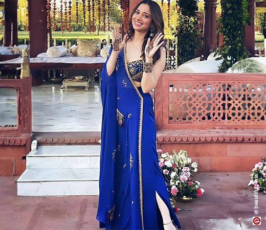 Tamanah Bhatia wearing a crop top, palazzo, and dupatta