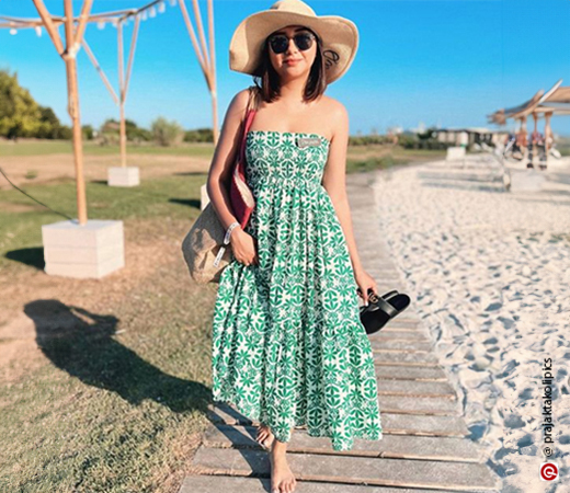 Prajakta Kohli wearing a tube dress and hat