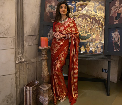 Shilpa Shetty wearing a string style back design blouse