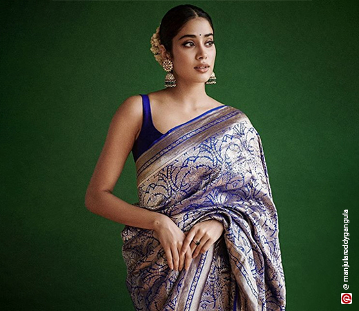 Jhanvi Kapoor wearing a sleeveless blouse