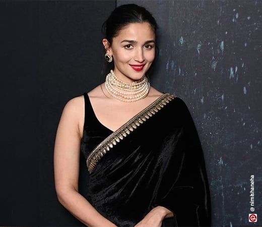 Alia Bhatt wearing a black saree